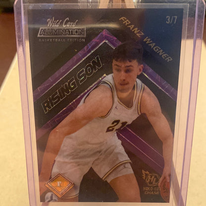 2021-22 Wild Card Rising Son Purple Holo Lux Chase #RS-6 Franz Wagner 3/7 Trading Card