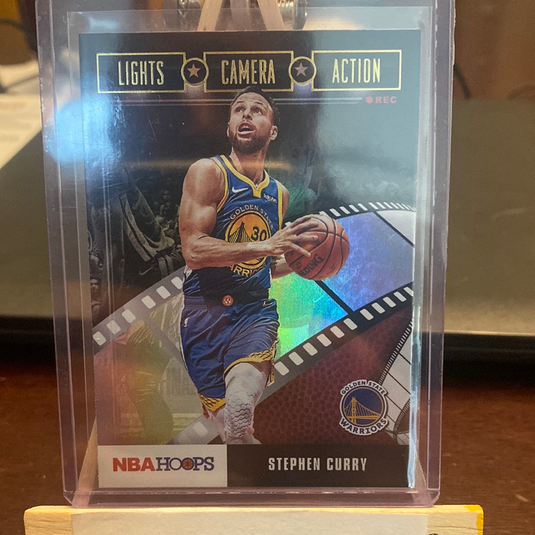 2019-20 Hoops Premium Steph Curry Lights Camera Action Silver Holo SP #2 Trading Card